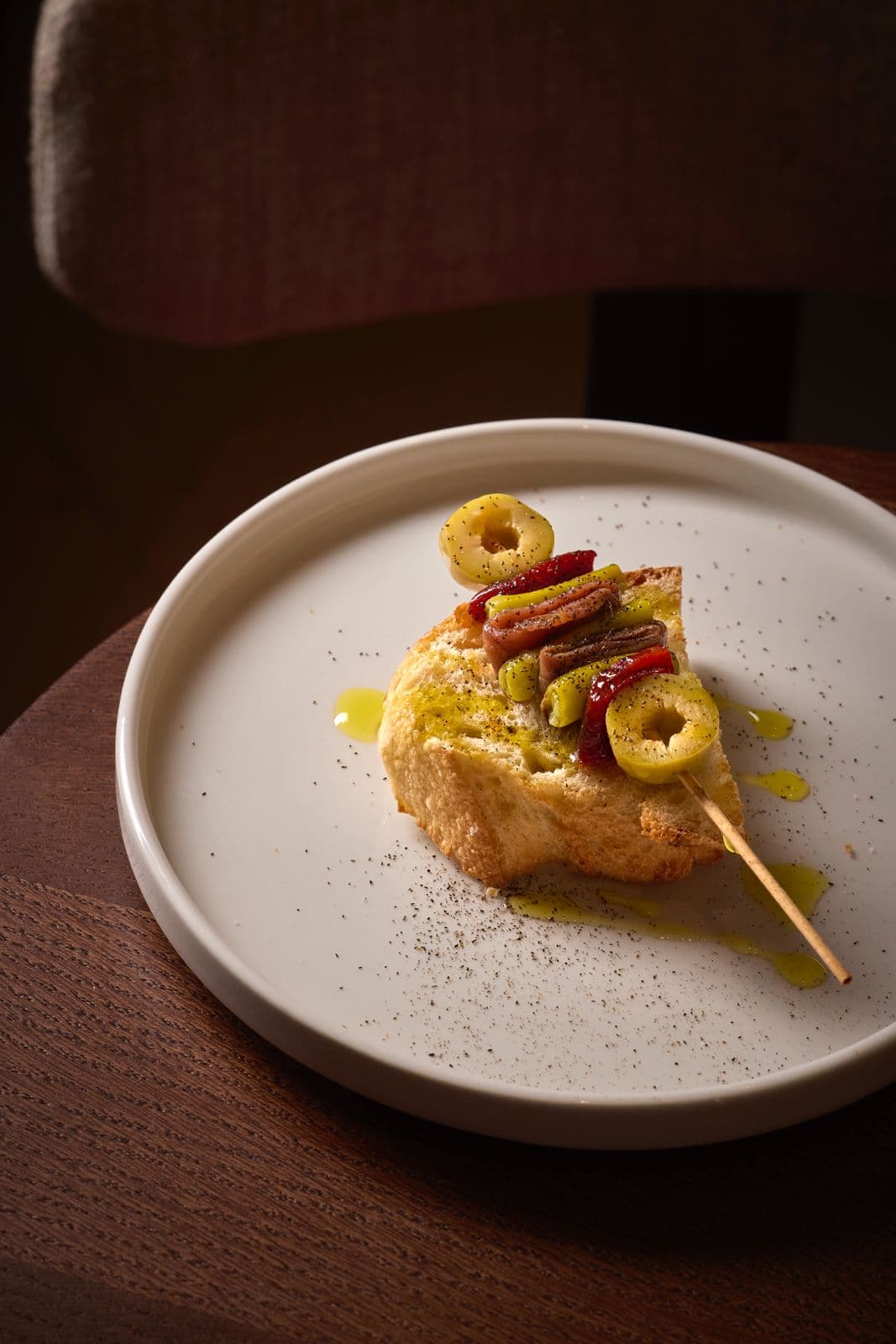 Gilda on toasted bread with olive oil