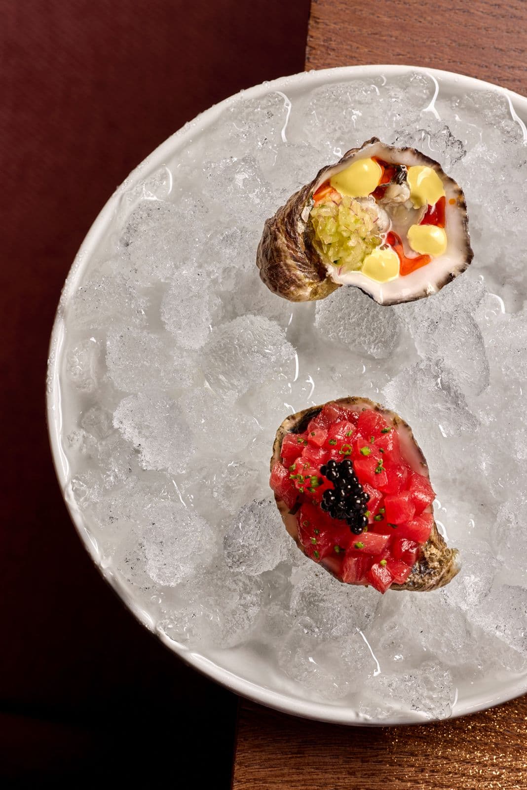 Tica Oyster and Tuna Oyster served on crushed ice